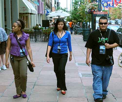Kisha Allison, Jacqueline Fernandez and Jonathan Mena cruising Denver streets looking for a good restaurant.